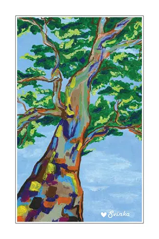 Whimsical greeting card of a rainbow-colored tree under a clear blue sky