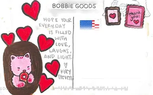 Hand-decorated postcard with a cat and hearts from Kiley wishing love, laughs and light