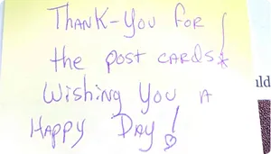 Handwritten note thanking Svinka for the postcards and wishing a happy day